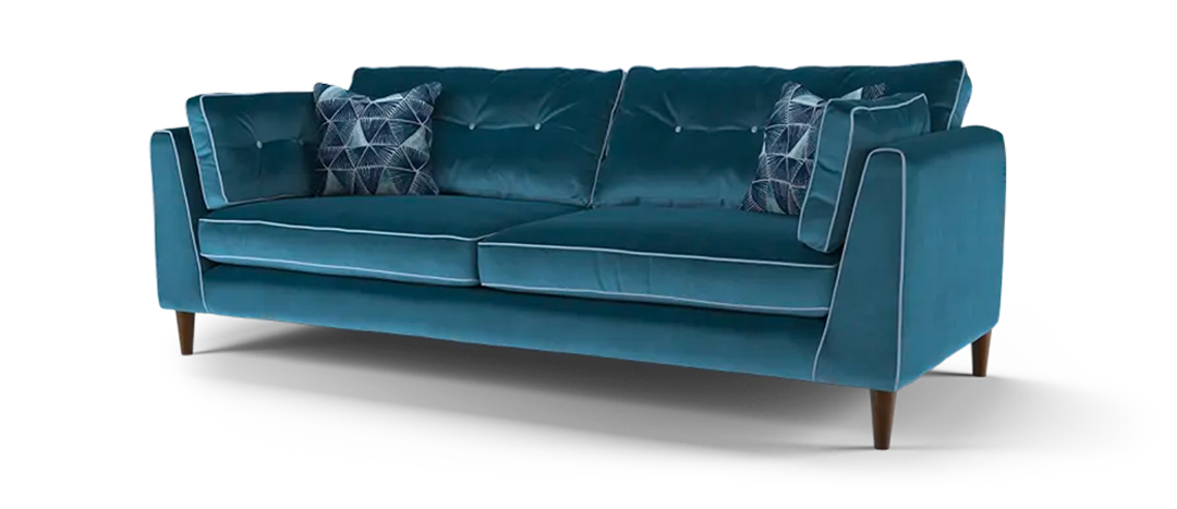 Sofology Cricket in teal fabric with patterned scatter cushions